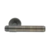 brass lever handle on round rose without escutcheon for doors