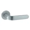 brass lever handle on round rose with escutcheon for doors