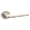 modern lever handle on round rose with escutcheon for interior doors